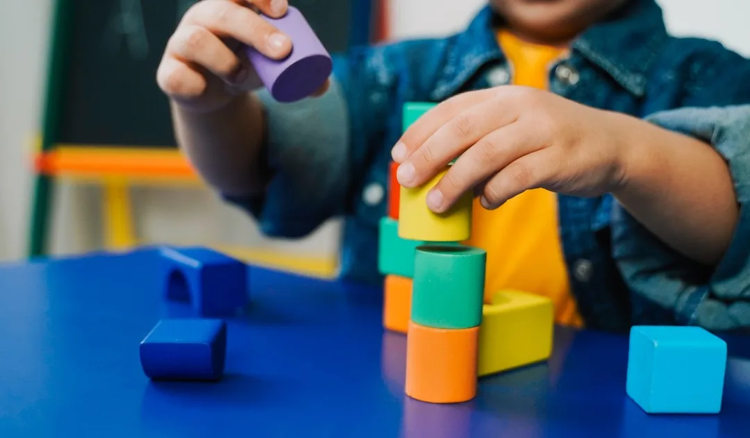 Colorful learning blocks arranged for an ABA activity